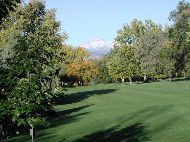 A view from the left side of a fairway at Sunset Golf Course