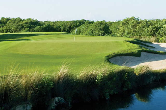 A view of a green at El Camaleon Mayakoba Golf Club