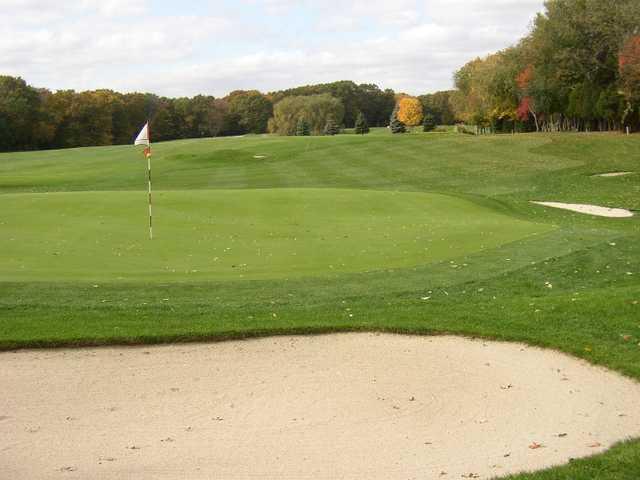 A view of the 15th green protected by bunkers at Norwich Golf Club