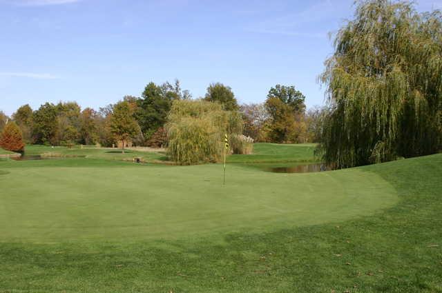 A view of the 13th green with water coming into play from Championship at Governors Run Golf & Country Club