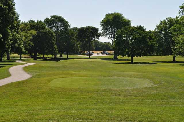 A sunny day view of a tee at Hawk's Tail of Greenfield