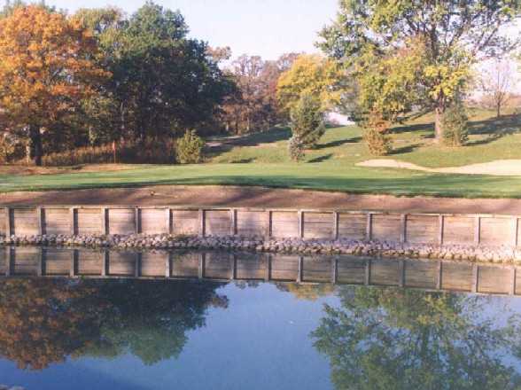 A view over the water of hole #16 at Big Run Golf Club