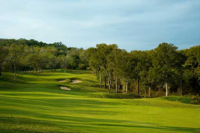 A sunny day view from the left side of a fairway at Wolfdancer Golf Club