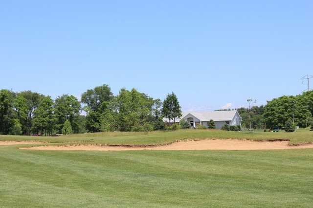 A view from the 6th fairway with the clubhouse in the distance at High Point Golf Club