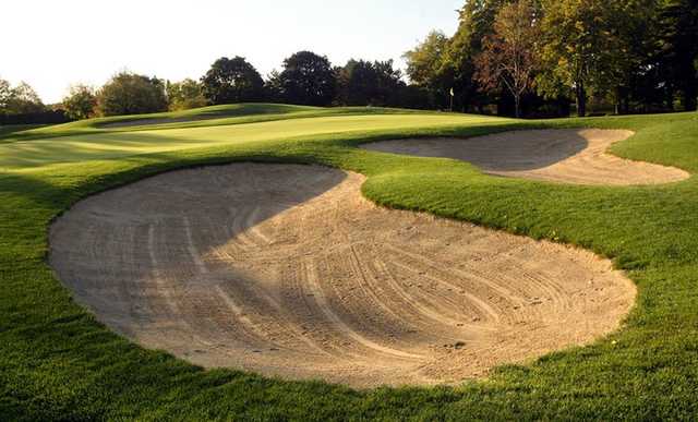 A view of a green protected by tricky sand traps at Village Links of Glen Ellyn