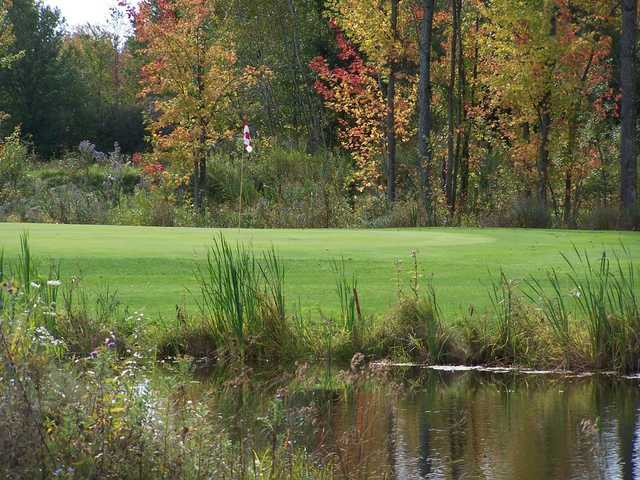 A view over the water of a hole at Rogues Roost Golf & Country Club