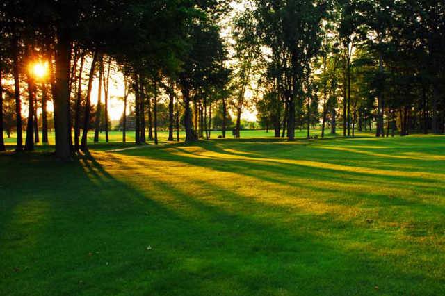 A sunny view of a fairway st Burford Golf Links