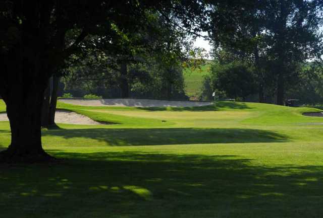 A view of a hole flanked by tricky sand traps at Conestoga Golf and Country Club