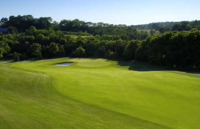 A view from the left side of a fairway at Mystic Golf Club