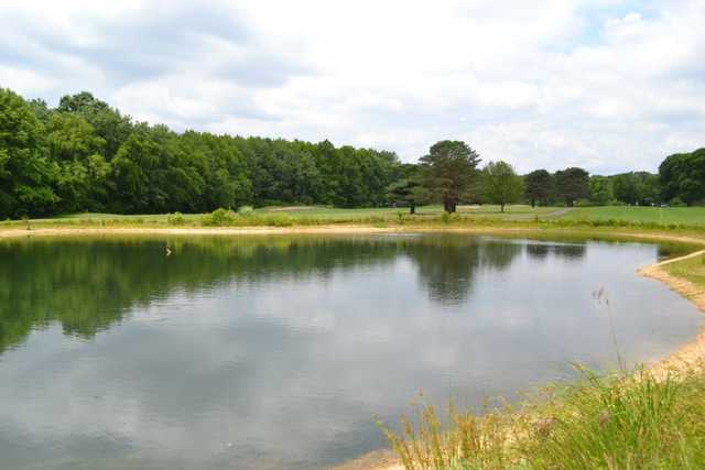 A view over the water of fairway #6 and #7 at Clearbrook Golf Club