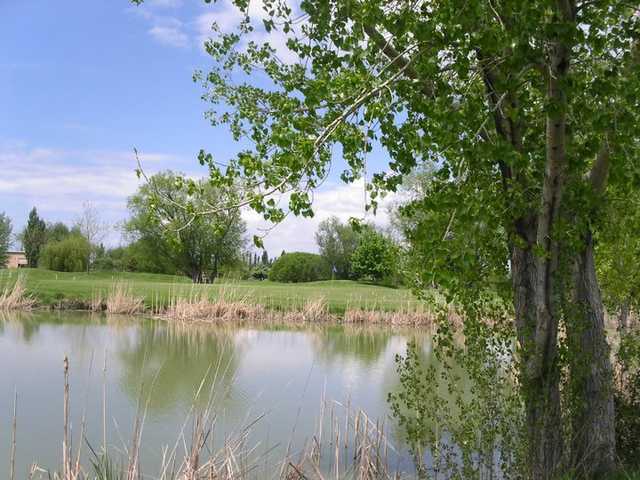 A view over the water of the 5th hole at Lakeside Golf Course