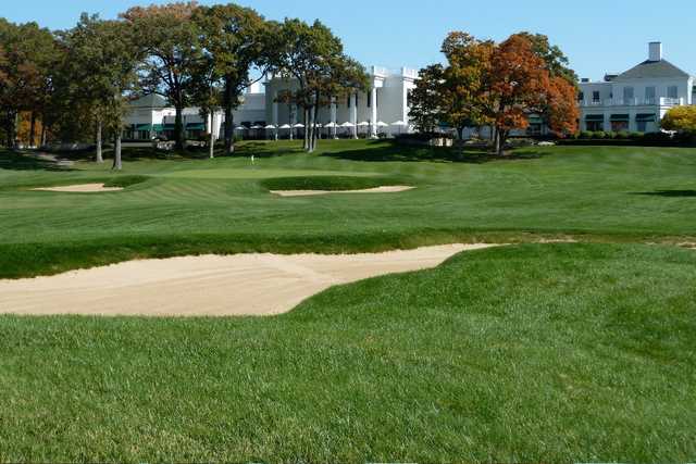 A view of a green flanked by bunkers at Exmoor Country Club
