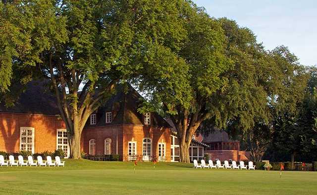 A view of the practice putting green and the clubhouse at Onwentsia Club