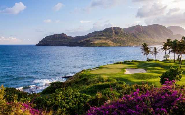 A view of a hole protected by bunkers at Kauai Lagoons Golf Club