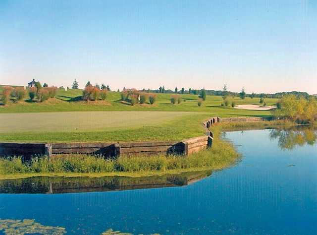 A view over the water of hole #14 at Wetlands Golf Club