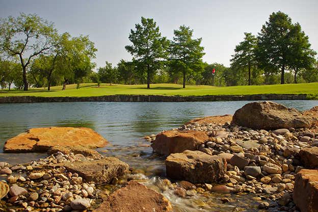 A view over the water from Red Course at Prairie Lakes Golf Course