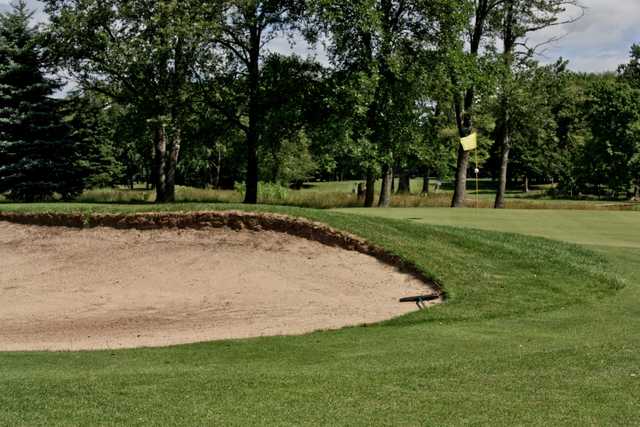 A view of a hole with a bunker on the left side at Gold from Winding Creek Golf Course