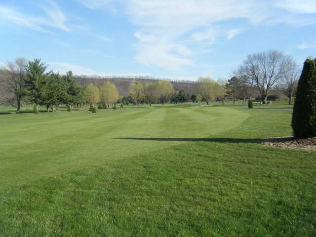 View of a fairway and green at Down River Golf Course