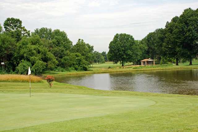 A view of a green with water coming into play at Elk Run Golf Club