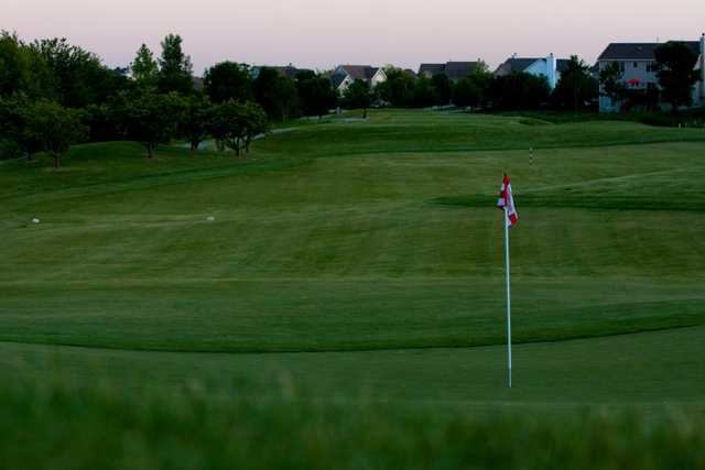 A view of a green and a fairway at Mill Creek Golf Club