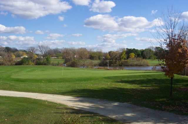 A view of green 11 with water in background at Cannon Golf Club