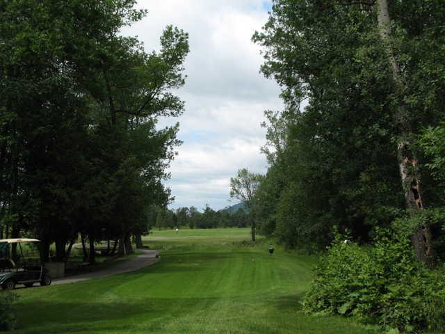 A view from a tee with a narrow cart path on the left side at Kingsway Park Golf and Country Club