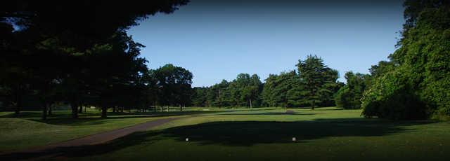 A view from a tee with a narrow cart path on the left side at Black from D. Fairchild Wheeler Golf Course