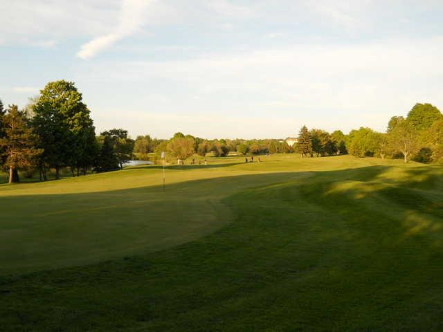 A sunny day view of a hole at Truro Golf Club.