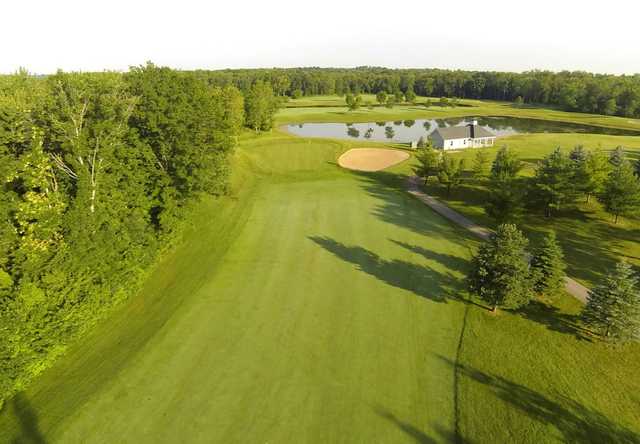 Aerial view of fairway and green #11 at Fairways of Woodside Golf Course