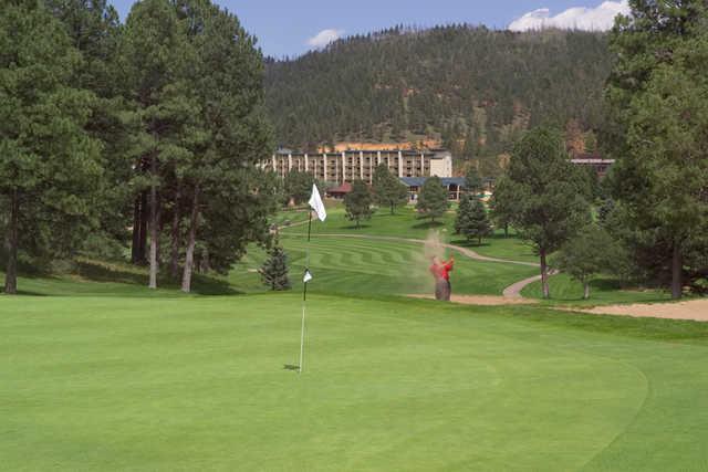 A view of a green at Inn of the Mountain Gods
