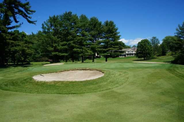 A view of a hole protected by tricky sand traps at Hiland Park Country Club