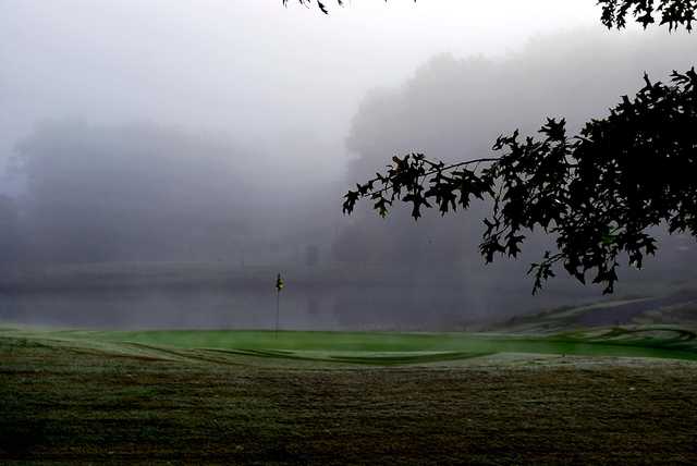 A view of a hole with water coming into play at Country Hills Golf Club