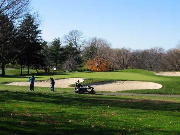 A view of a green protected by sand traps at Lancaster Host Golf Resort