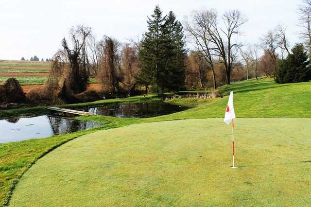 A view of the 16th green at Anchored Golf Course