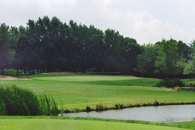 A sunny day view from a tee at Lake Barrington Shores Golf Club