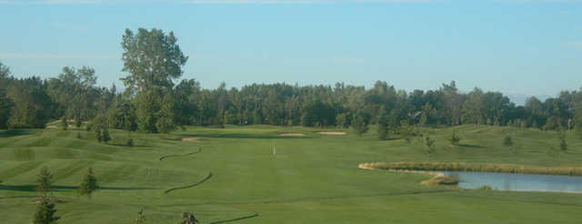 View of fairway and green at Cardinal Lakes Golf Club - Heron Course