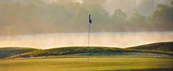 View of a green in the morning at Northwoods Golf Course