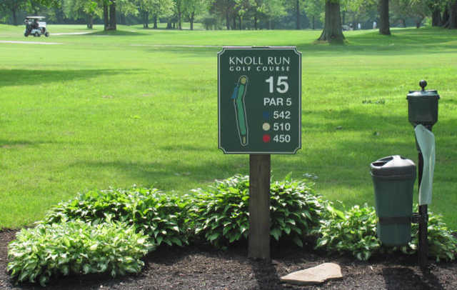 A view from the 15th tee sign at Knoll Run Golf Course