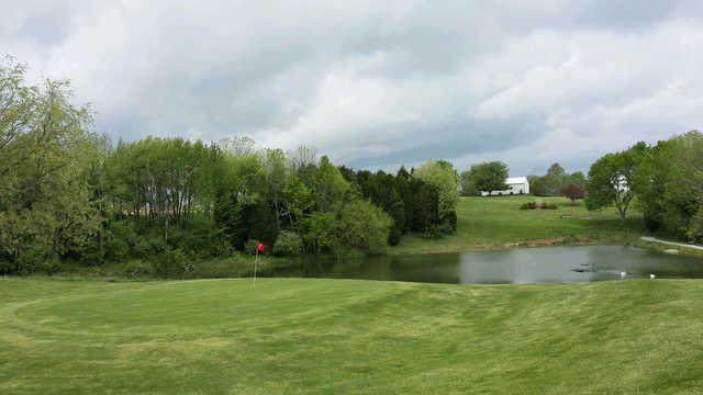 A view of green #7 with water coming into play at Cozy Acres Golf Links