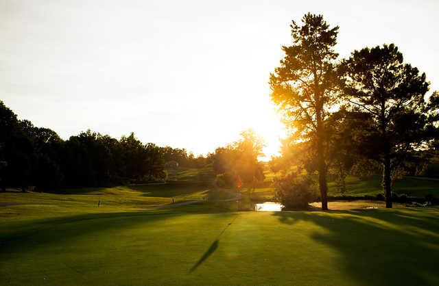 A sunny day view of a green at Southwick Country Club (McKnight Media)