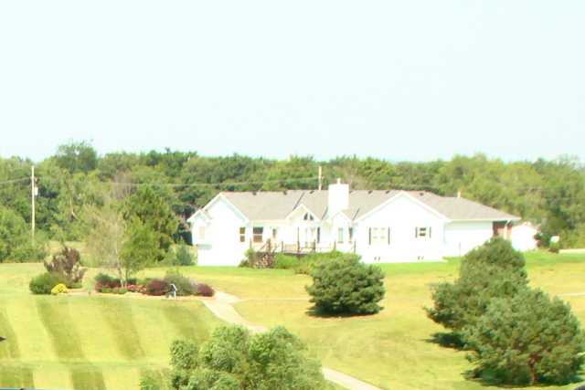 A sunny day view from Lake Ridge Golf Course