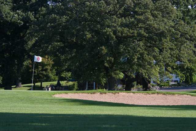 A view of green #9 guarded by a bunker at Timber Creek