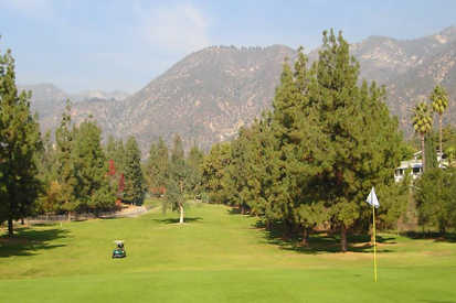 A view of a hole with mountains in background at Eaton Canyon Golf Course