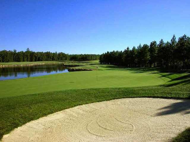 A view of a green with water coming into play at The Golf Club at Mattaponi Springs.