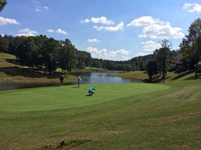 A view of a green with water coming into play at Terri Pines Country Club