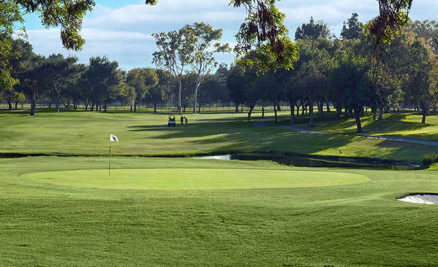 A sunny day view of hole #1 at El Dorado Park Golf Club.