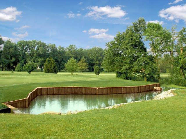 A view over the water of the 3rd green at Lawrence County Country Club