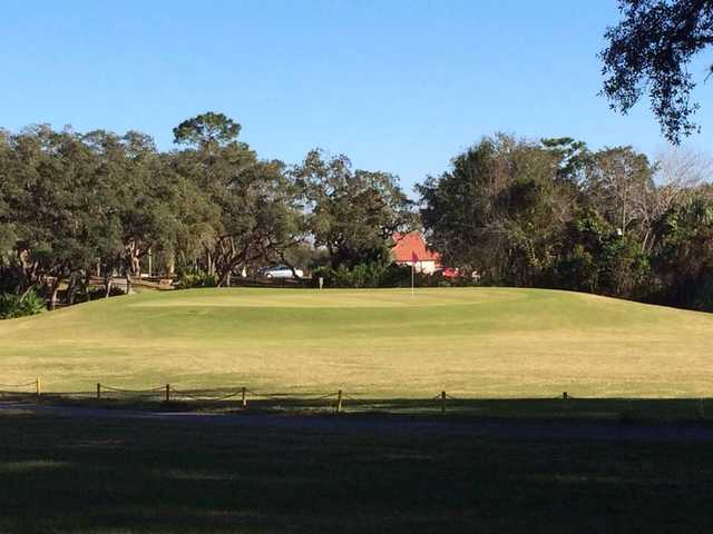 A sunny day view of a hole at Heather Golf & Country Club