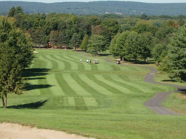 A view of a tee and a fairway at Southington Country Club