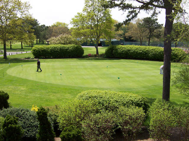 A view of the putting green at Pine Hills Country Club